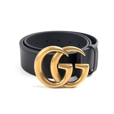 gucci belt black gold buckle.